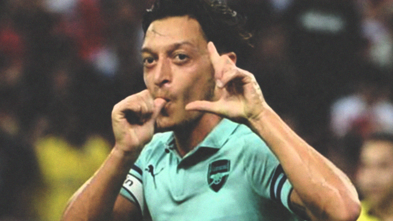 Mezut Ozil usai membobol gawang PSG. foto:gettyimage