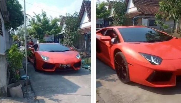 Mobil Lamborghini Aventador berwarna merah melintas di jalan yang ada di Desa Ngayung, Kecamatan Maduran, Lamongan, Jawa Timur. (Foto: Tangkapan layar Facebook Fabian Rayhan)