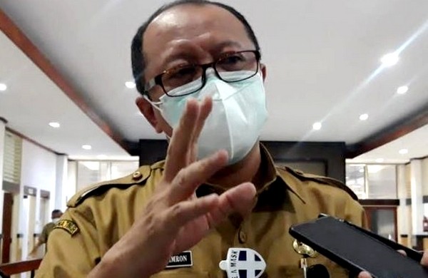 Kepala Dinas Kesehatan Bondowoso yang juga jubir Satgas Covid-10 setempat, dr.Mohammad Imron. (foto:Guido/Ngopibareng.id)