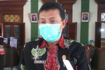 Kepala Dinas Pemberdayaan Perempuan dan Keluarga Berencana Bondowoso, dr. Agus Suwardjito. (foto: guido/Ngopibareng.id).