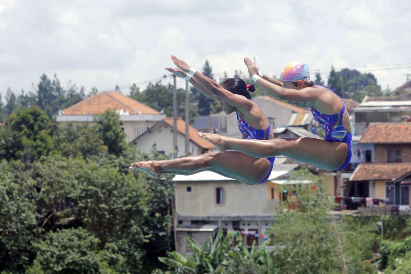 Ilustrasi atlet loncat indah Jatim saat tampil di PON 2016 Jawa Barat. (Foto: Fariz Yarbo/Ngopibareng.id)