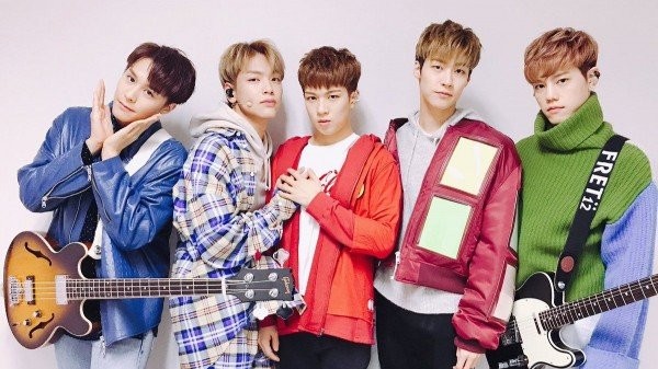 Cha Hun (paling kanan) bersama member band rock rap Korea Selatan, N.Flying. (Foto: FNC)