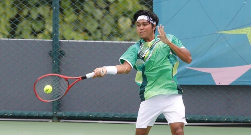 Atlet Tenis Jatim, Rifqi Fitriadi tampil di PON XX 2020 Papua. (Foto: KONI Jatim)