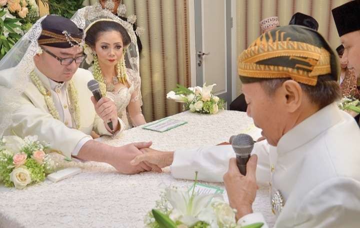 Ilustrasi prosesi akad nikah secara tatap muka. (Foto: Istimewa)