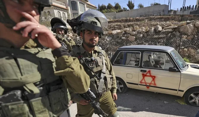 Pada pertengahan November, puluhan pemukim menyerang sekelompok warga Palestina dan aktivis Israel dengan batu dan pentungan, membuat seorang wanita dirawat di rumah sakit dan melukai beberapa orang lainnya. (Foto: AFP)