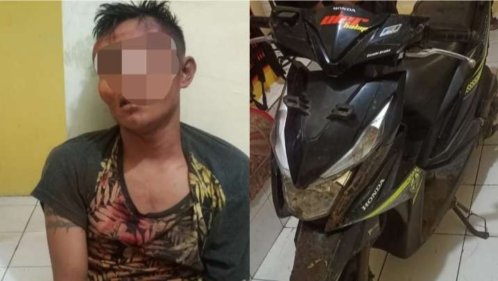 Tersangka RM diamankan polisi dalam kondisi babak belur dihajar massa (Foto:Istimewa)