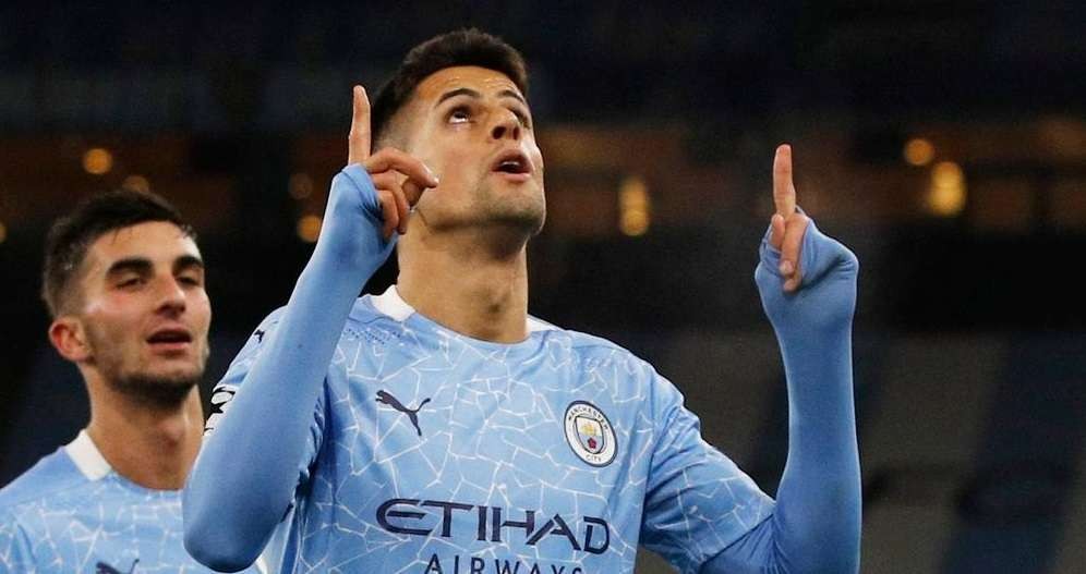 Joao Cancelo dilaporkan sedang tak harmonis dengan manajer Manchester City, Pep Guardiola. (Foto: Twitter/@joaocancelopt)