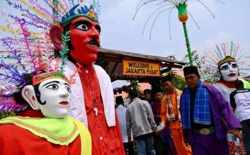 Orang Betawi dan simbolnya, Ondel-ondel. (Ilustrasi)