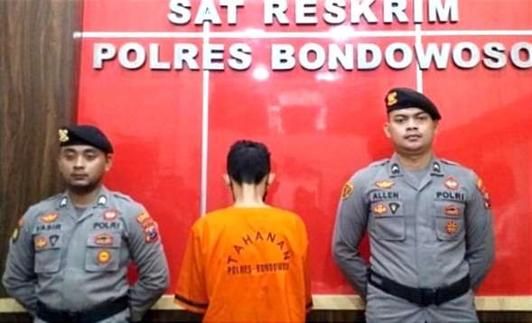 Fauzi, 47 tahun, tersangka pembunuhan istrinya sendiri Imelda, 31 tahun di kamar hotel ternama di Bondowoso. (Foto: Guido/Ngopibareng.id)