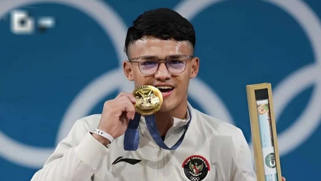 Rizki Juniansyah meraih medali emas cabang olahraga angkat besi 73 kg di Olimpiade Paris 2024. (Foto: Instagram)