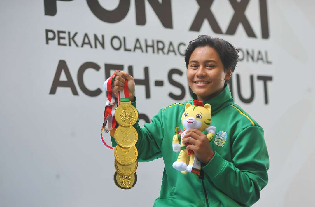 Atlet loncat indah Jawa Timur, Gladies Lariesa Garina Hagakore, menjadi atlet Jatim tersukses dengan raihan 5 medali emas. (Foto: KONI Jatim)