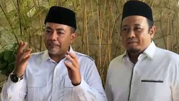 Pasangan calon dr. Mohammad Haris - Lora Fahmi Abdul Haq Zaini. (Foto: Ikhan Mahmudi/Ngopibareng.id)