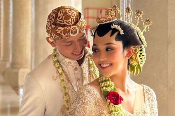 Atlet bulutangkis ganda putra Indonesia, Muhammad Rian Ardianto resmi menikahi pasangannya, Ribka Sugiarto, Sabtu, 28 September 2024. (Foto: Ant)