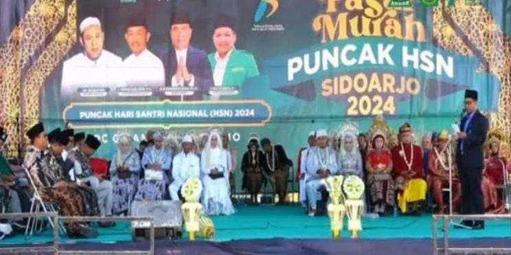 Prosesi Ngunduh mantu GP Ansor Sidoarjo. Ada 31 pasang yang ikut menjalankan sunnah Rasul ini. (Foto: Andor for ngopibareng.id)